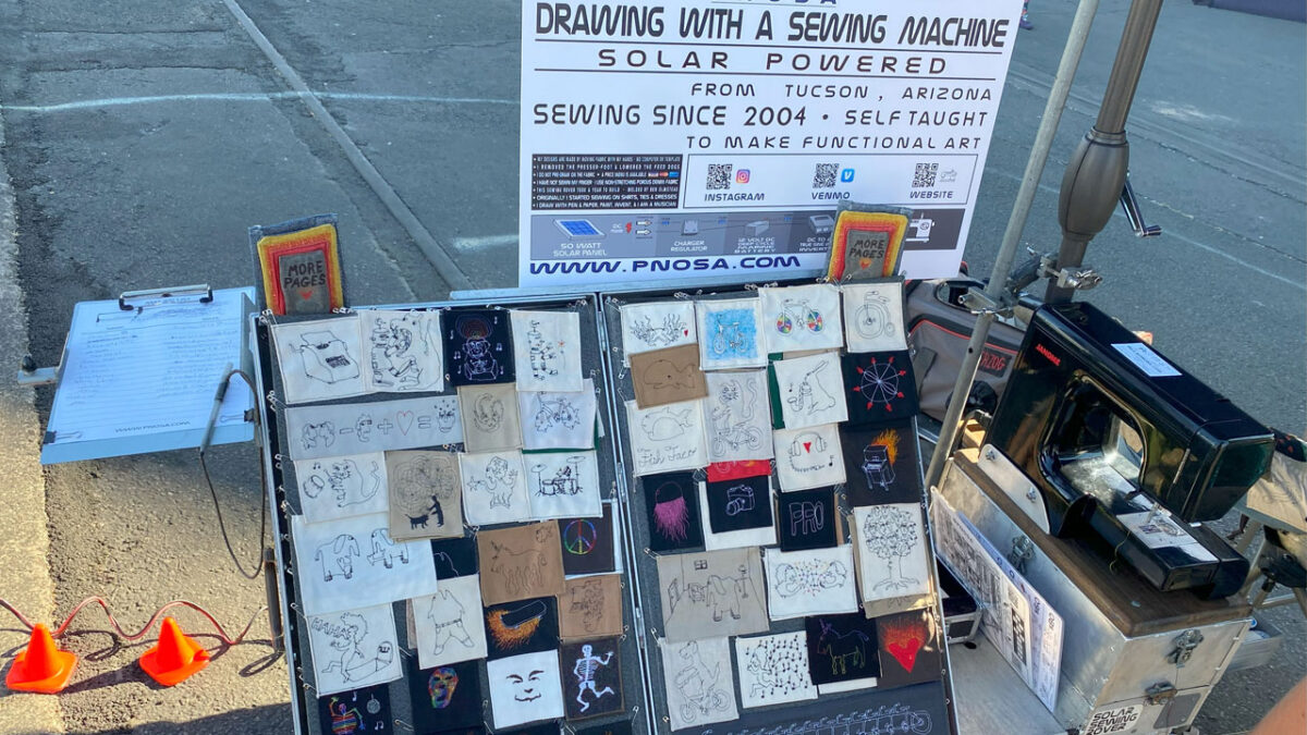 Solar Sewing Rover and a display of small sewing projects.