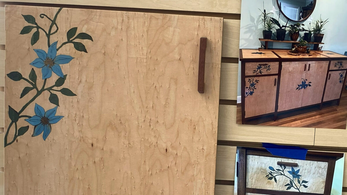 A composite image showcasing woodworking projects featuring intricate floral marquetry. The largest section displays a close-up of a tall, light-colored wood cabinet door with a dark vertical handle; the left side features an inlaid design of blue flowers with green vines. The top right inset shows a full view of a matching sideboard or credenza with dark wood framing, adorned with similar blue floral inlays on its drawers and doors. The bottom-right inset offers a close-up of a drawer front with light figured wood and matching floral marquetry details.