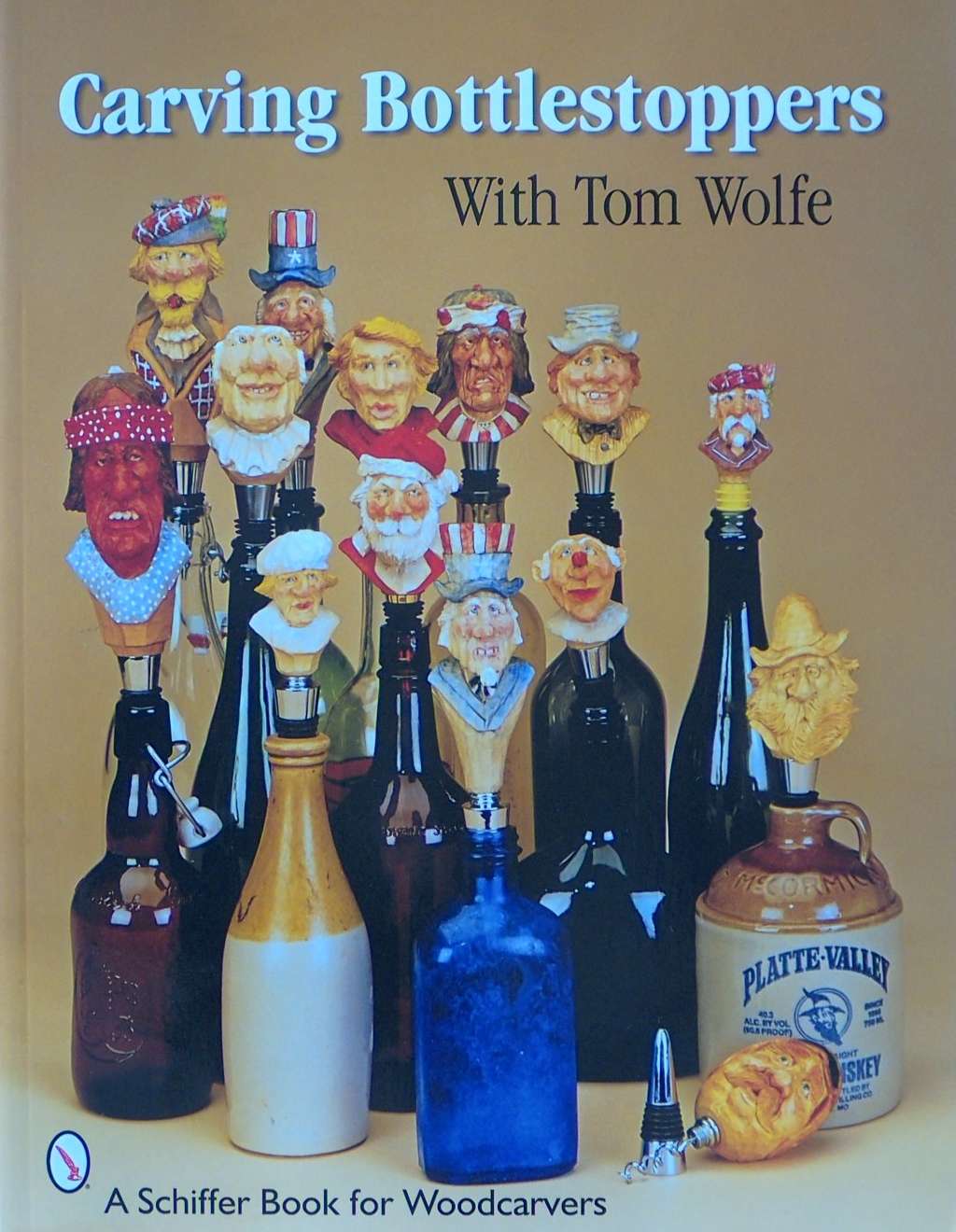 An image of a woodcarving book cover: Carving Bottlestoppers by Tom Wolfe