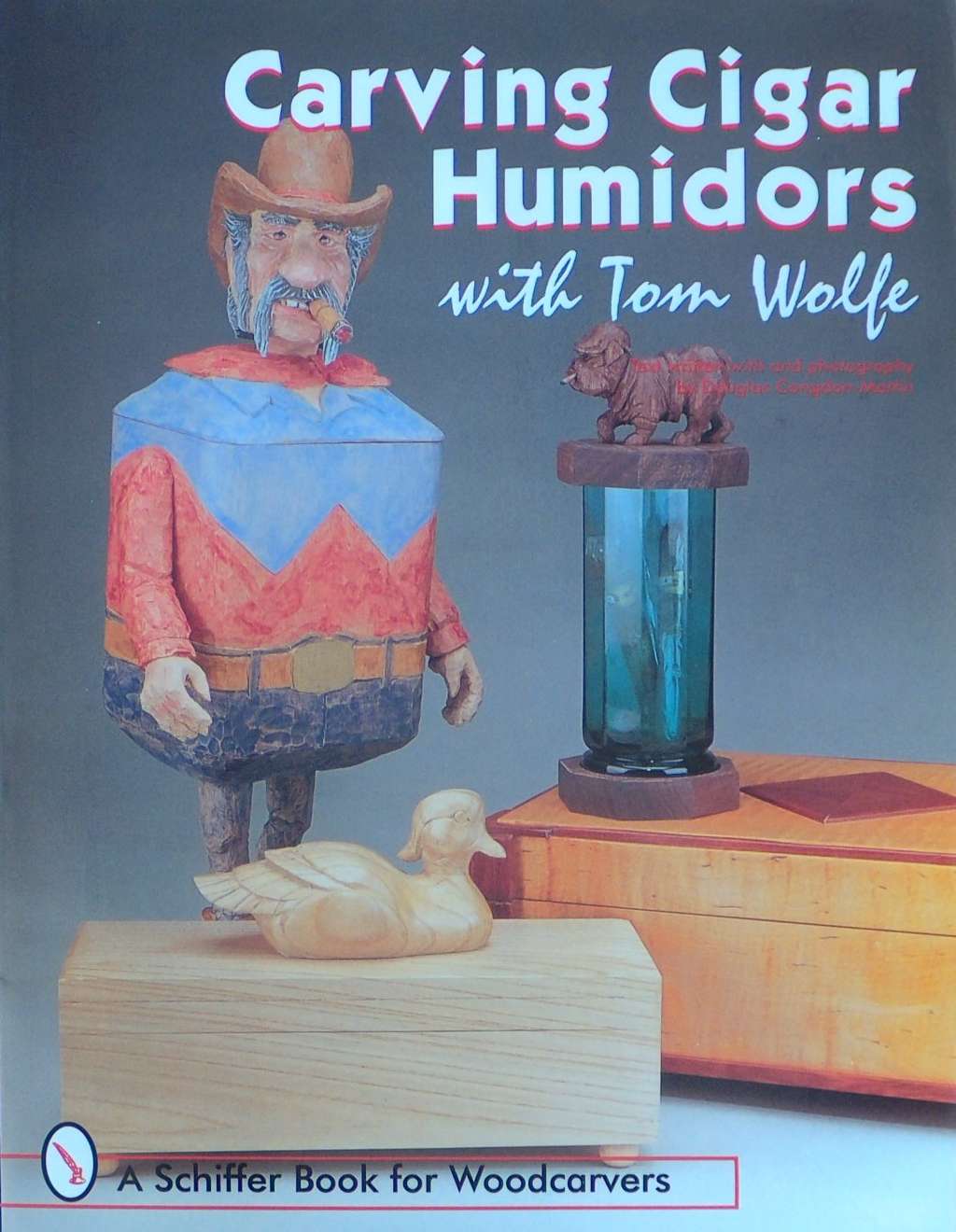 An image of a woodcarving book cover: Carving Cigar Humidors by Tom Wolfe