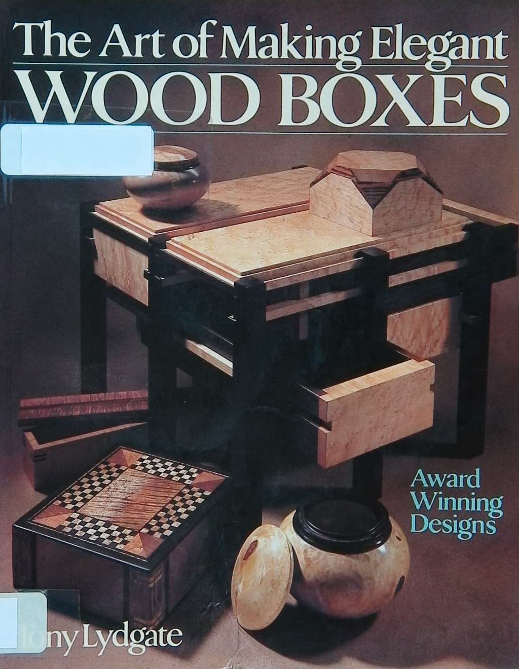 An image of a woodworking book cover: The Art of Making Elegant Wood Boxes by Tony Lydgate