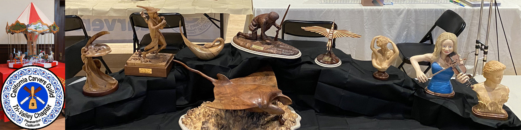Feature image for the 2026 Tri-Valley Carvers Show in Pleasanton, CA, featuring the club logo, an iconic carousel model, and woodcarvings by Bob Kehl.