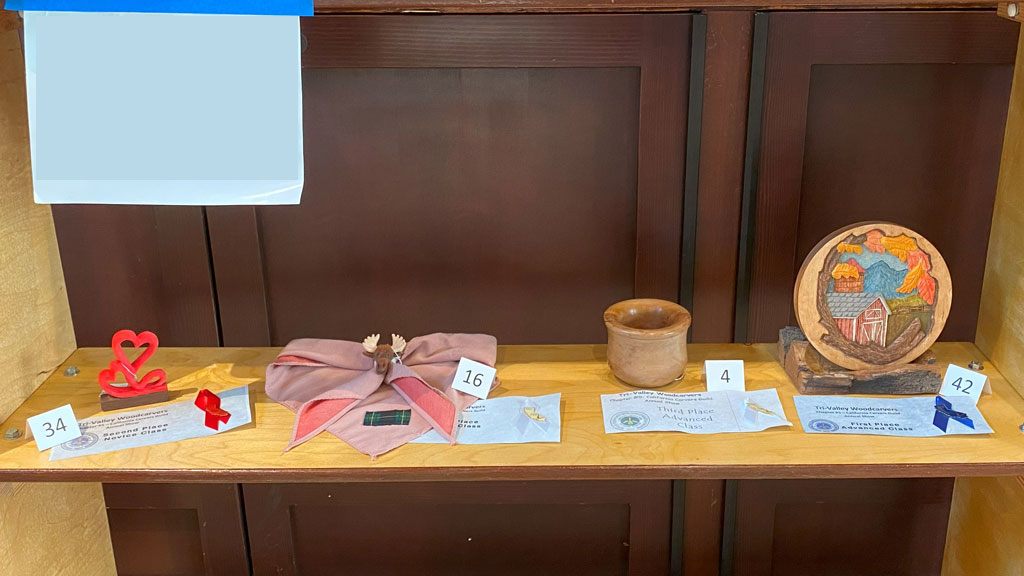 Woodcarving show competition: shelf 1, bottom
