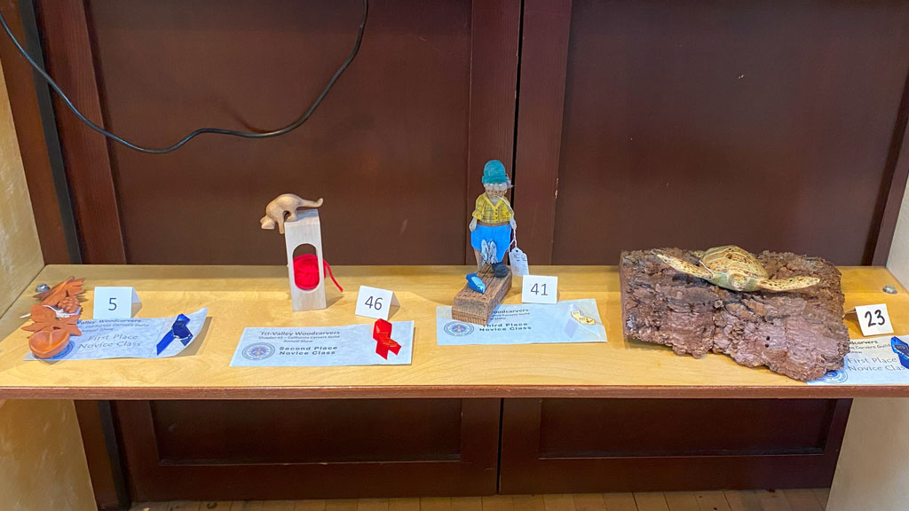 Woodcarving show competition: shelf 5, bottom