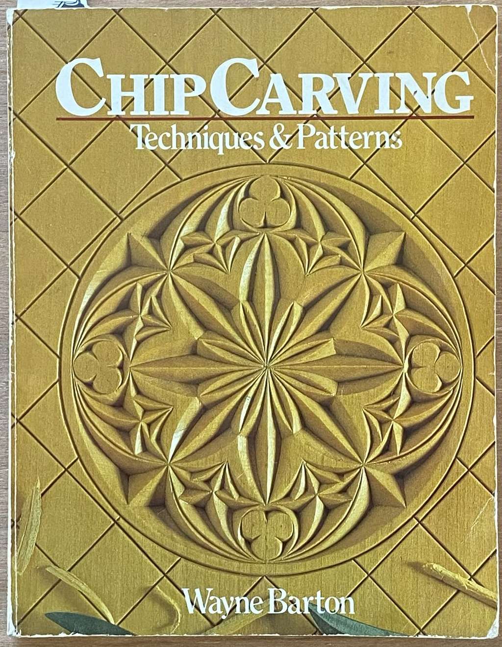 An image of a woodcarving book cover: Chip Carving Techniques & Patterns by Wayne Barton