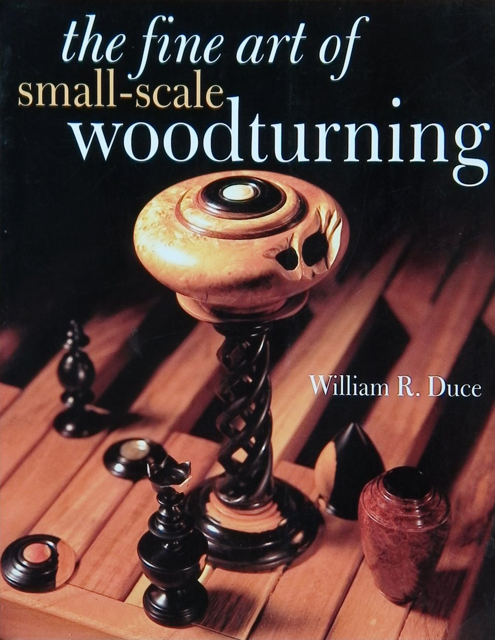 An image of a woodturning book cover: The Fine Art of Small-Scale Woodturning by William R. Duce; 1999, 144p