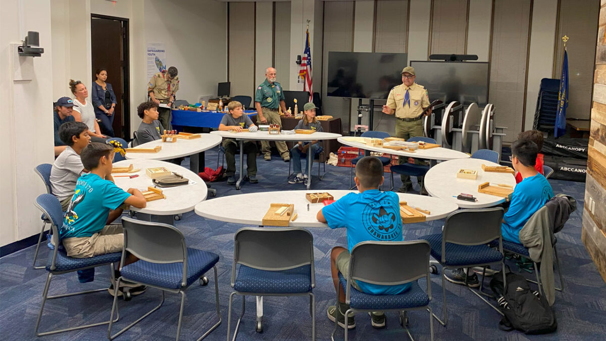 Woodcarving training in progress with 8 scouts and 3 scouting leaders.