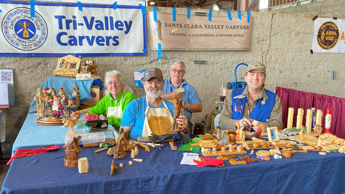 Woodcarving demonstration at Maker Faire. From left to right: Ann Bruner-Welch, Dave Richards, Ken Morgan, and Roman Chernikov.