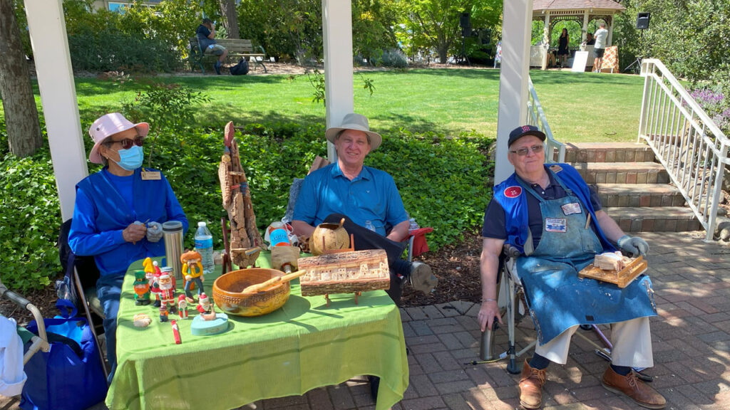 Wood carving demonstrators Blossom Festival in Saratoga, CA: Kathy Moor, Michael Nemecek, and Jim Phipps.