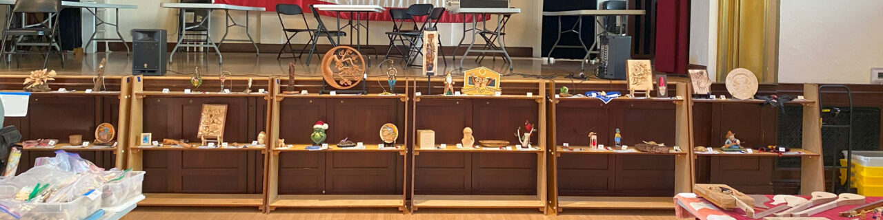 Woodcarving show competition: 48 carvings on shelves