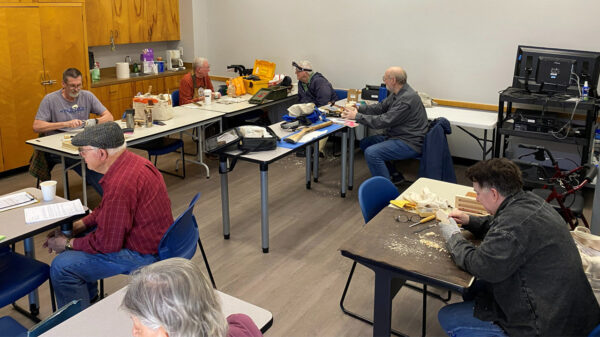 A few SCVC members are carving and chatting at our meeting on Monday, February 2026. The picture was taken for the SCVC woodcarving newsletter.
