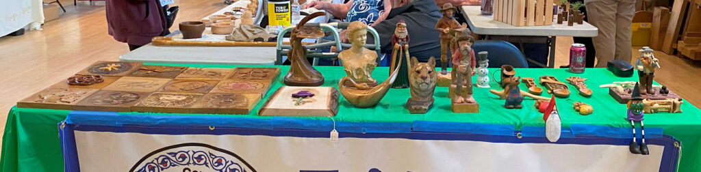 Wooden quilt and other projects carved by members of the Tri-Valley Carvers club.