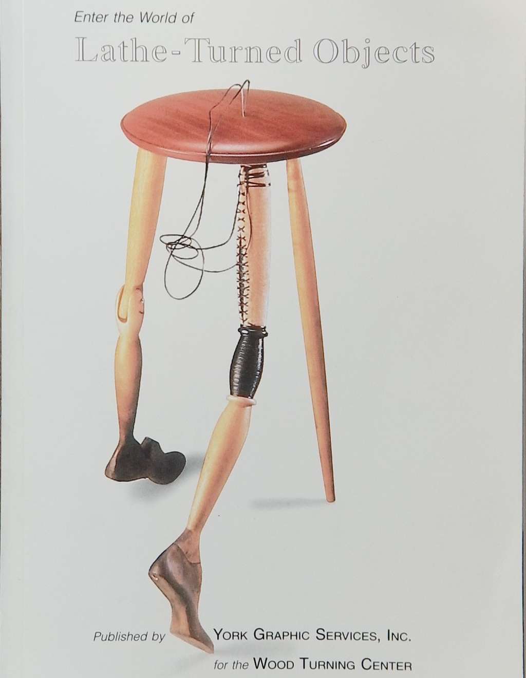 An image of a woodturning book cover: Enter the World of Lathe-Turned Objects by York Graphic Services, Inc.